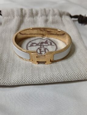 Hermes White Enamel and Gold H Clic Clac Bracelet